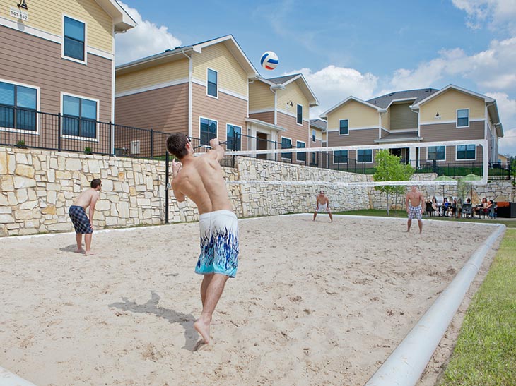 Sand Volleyball Court At Villas on Sycamore Near Sam Houston State