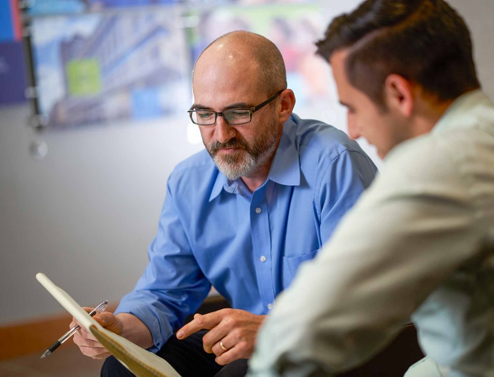 Corporate Staff Team Members in a meeting