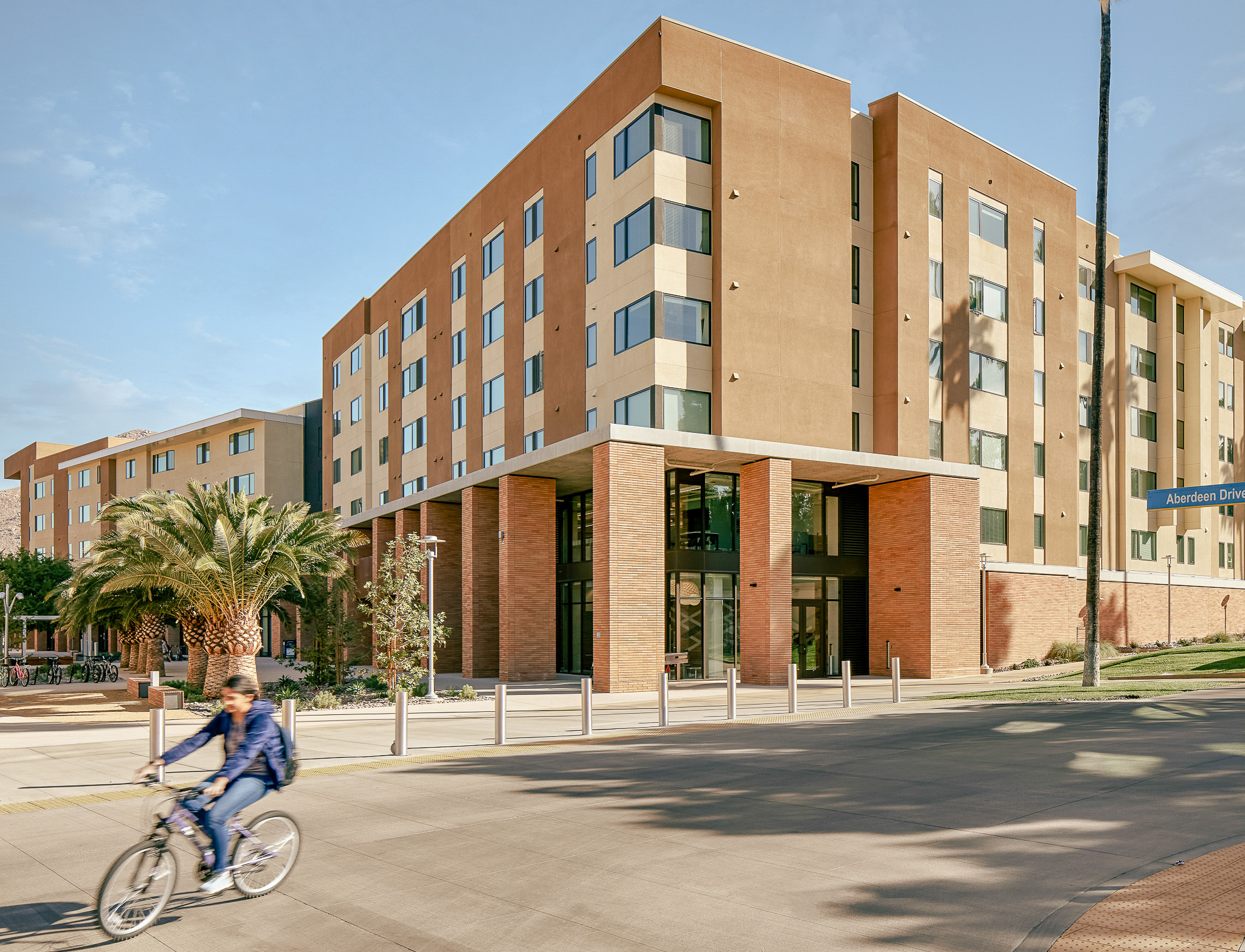 Student biking outside of UCR North District